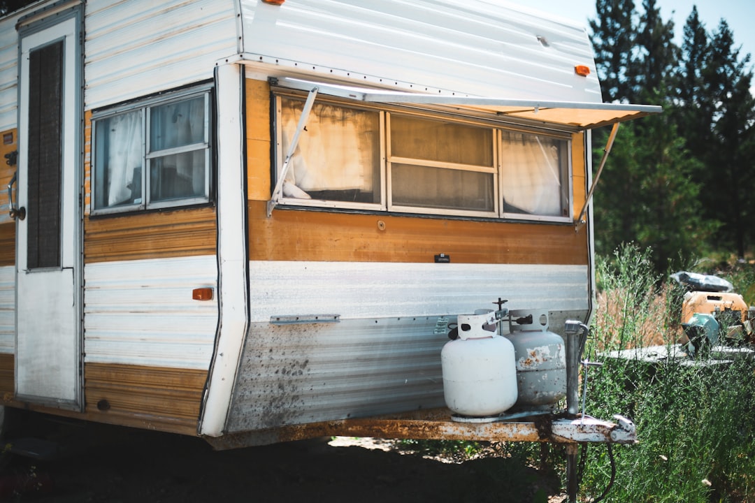 Renter checking propane level on a Class C