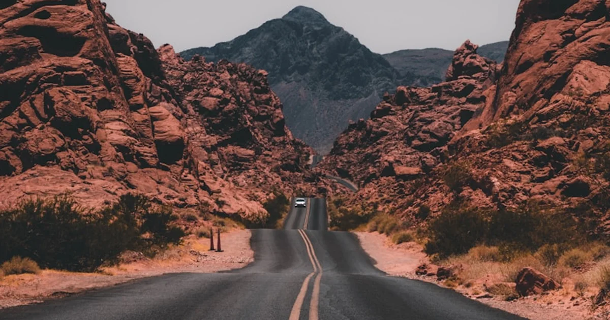 Open road with a motorhome on a mountain highway